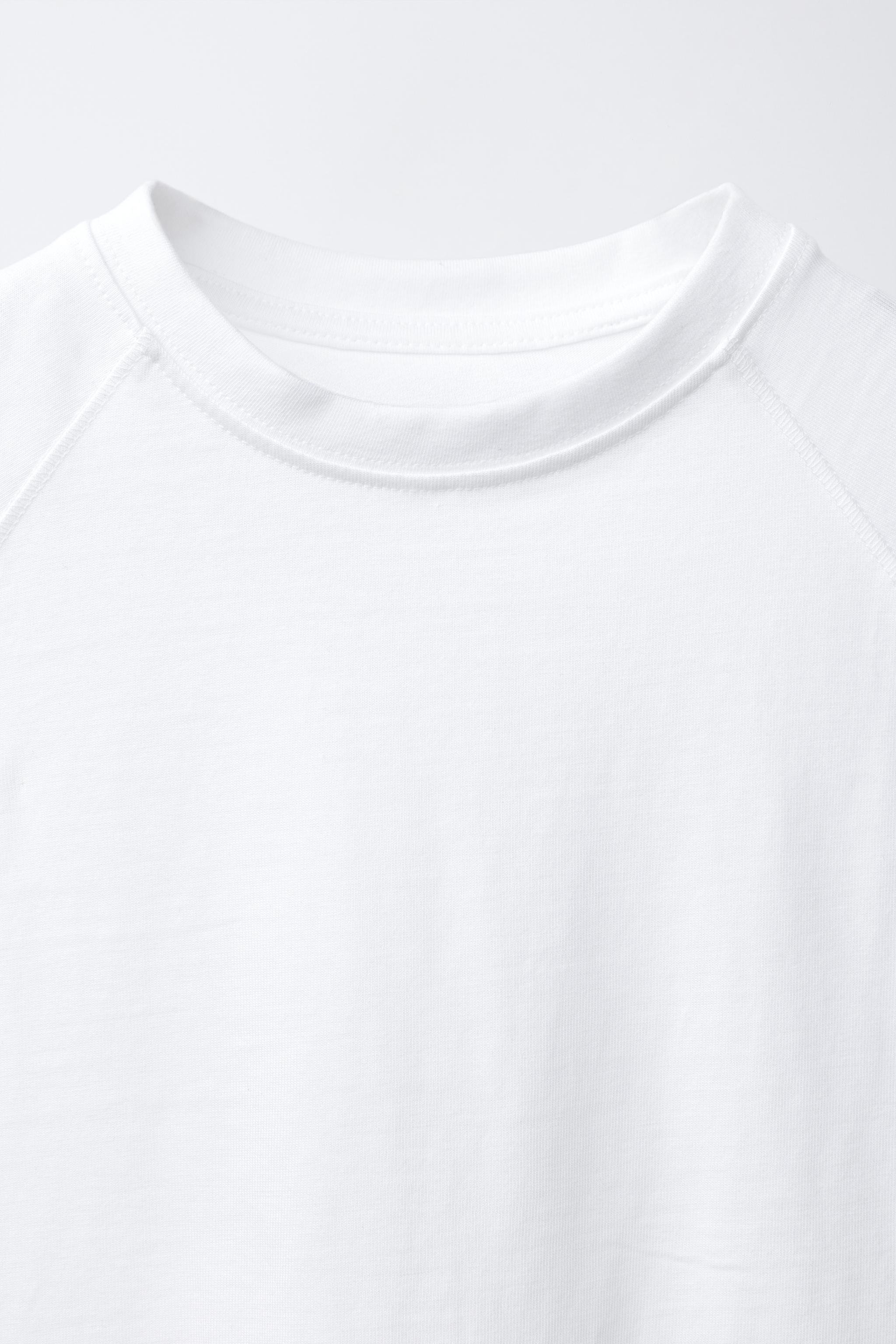 T-SHIRT UNI SANS MANCHES